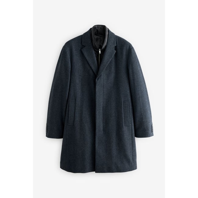 Manteau rembourré et faux gilet bleu marine <span itemprop=