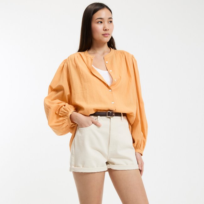 Blusa amplia, cuello redondo, manga larga amarillo ocre <span itemprop=