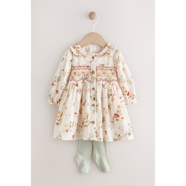Robe bébé avec col imprimé floral crème/personnage <span itemprop=