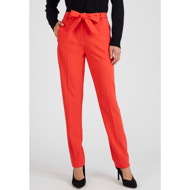 Pantalon fuselé en maille rouge <span itemprop=