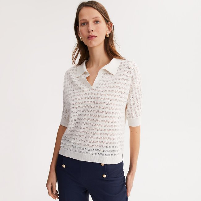 Jersey de cuello polo en punto de pointelle, composición mayoritaria de lino marfil <span itemprop=