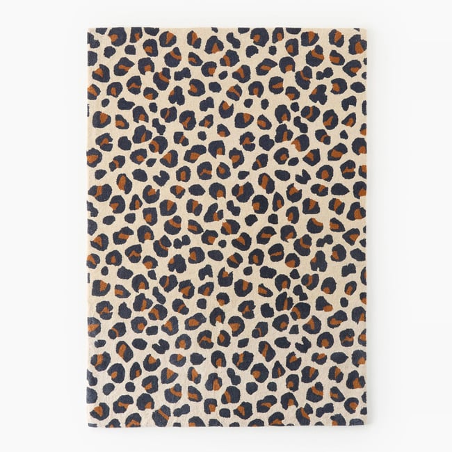 Tapis tufté léopard , 100% laine Couleur off white <span itemprop=