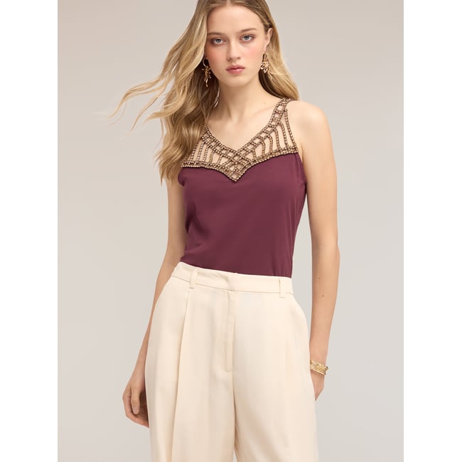 Top en résille avec strass violet <span itemprop=