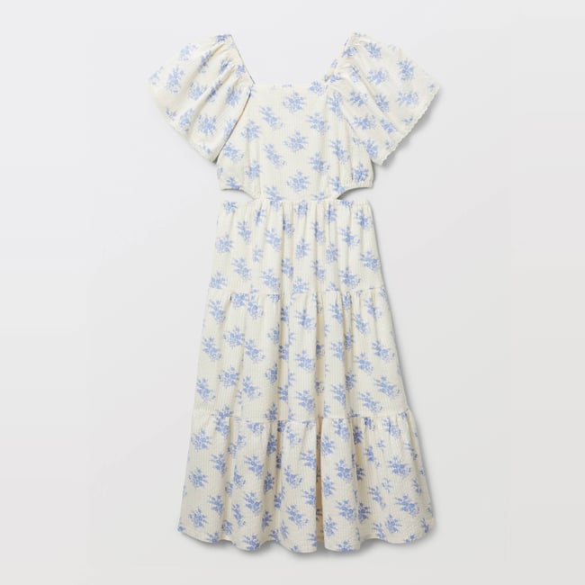 Robe imprimée fleurie avec détails de découpes butter cream <span itemprop=