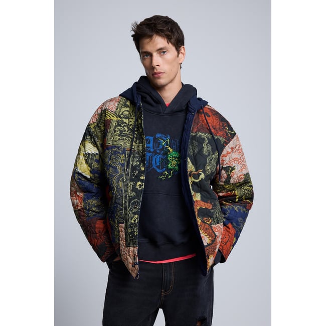 Veste réversible à capuche bleu <span itemprop=