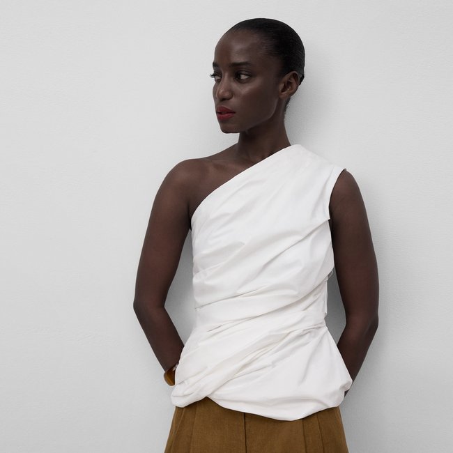 Haut asymétrique drapé en coton blanc <span itemprop=