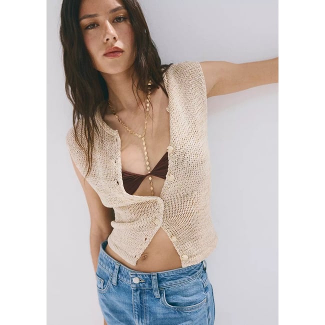 Gilet à boutons en maille chinée beige <span itemprop=