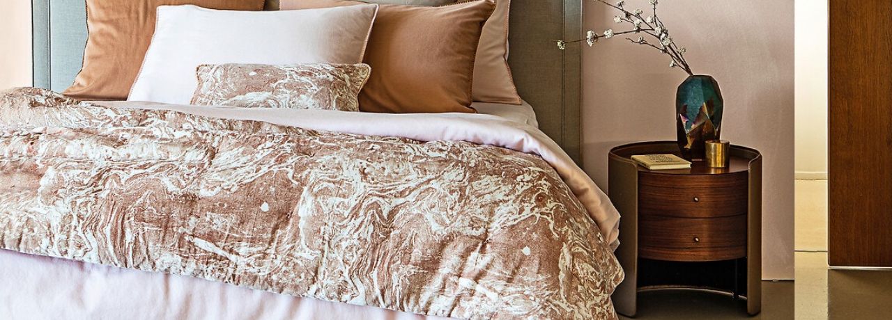 Wie kann man aus einer Bettdecke ein sch&ouml;nes Bett machen?