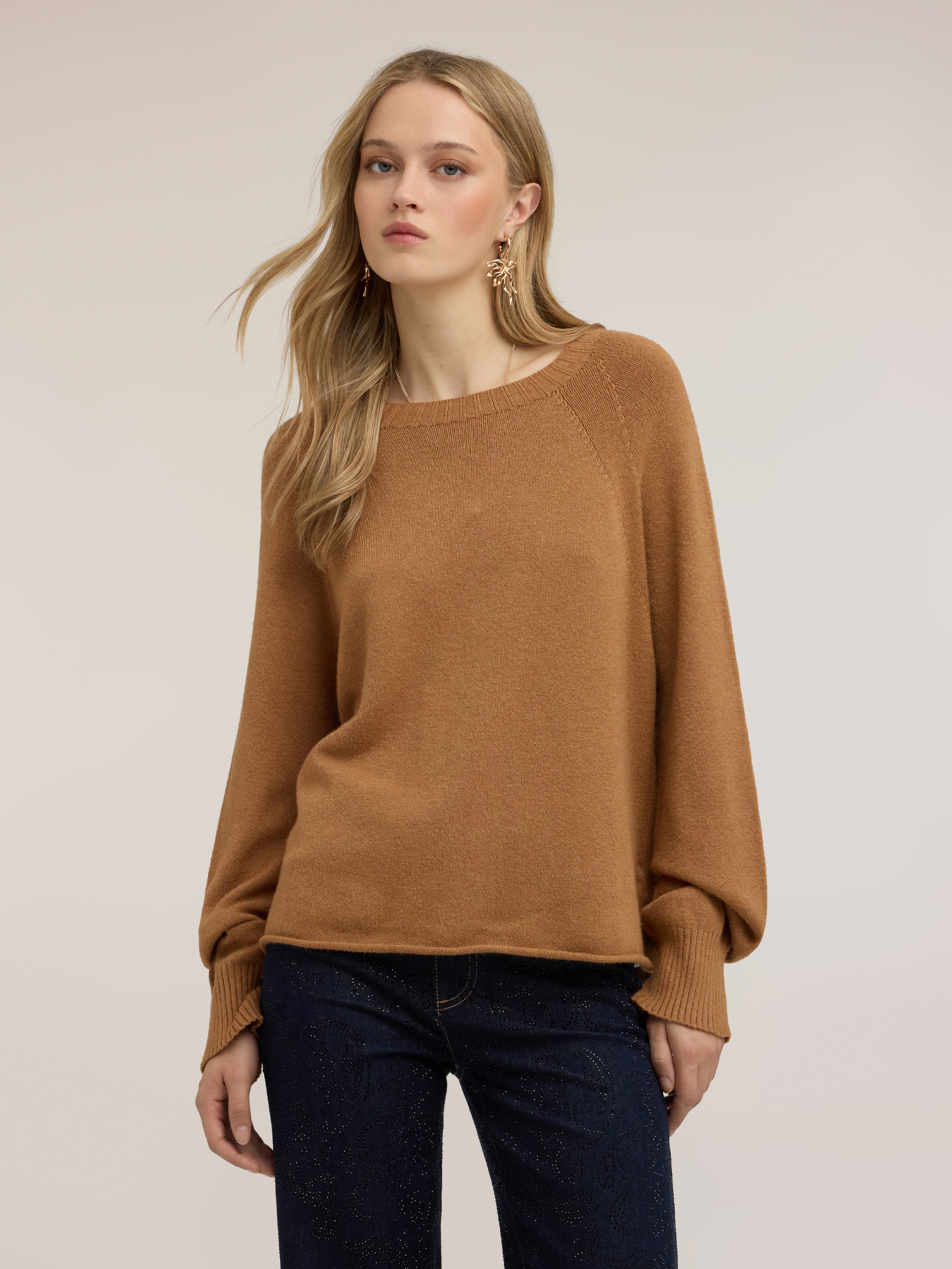 Pull ras du cou, MOTIVI