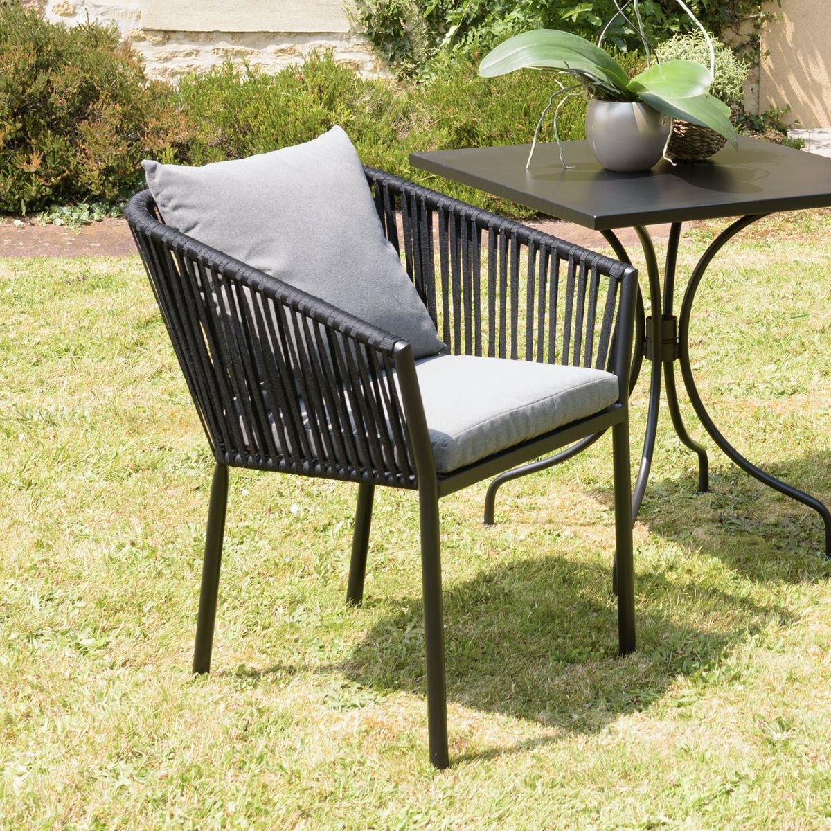 Salon de jardin 1 table teck 180x100 cm - 6 fauteuils cordage noir