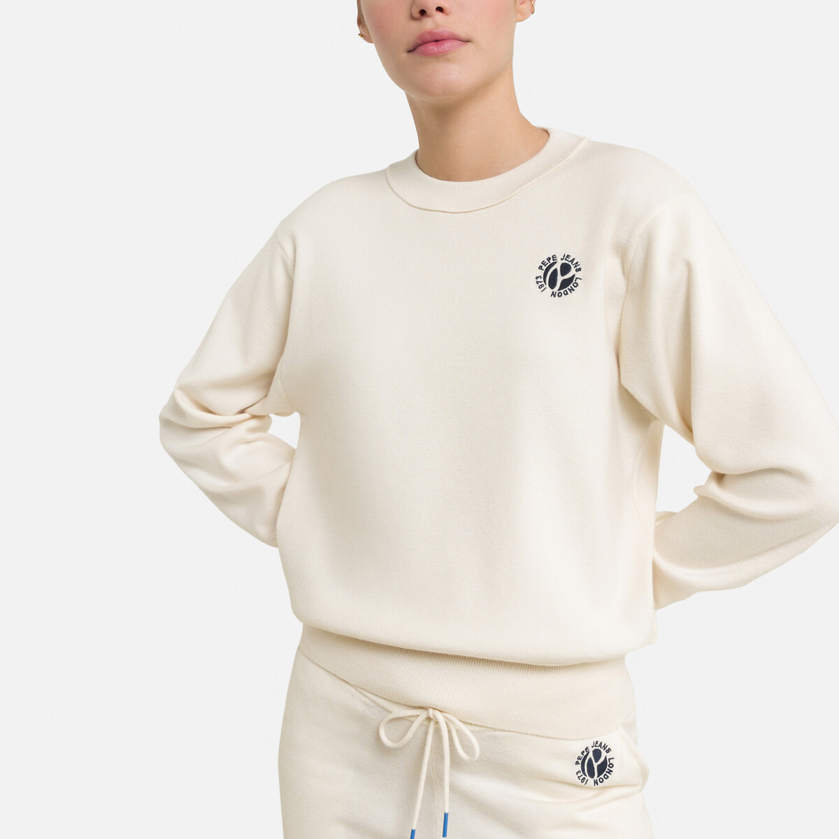 beige crew neck jumper