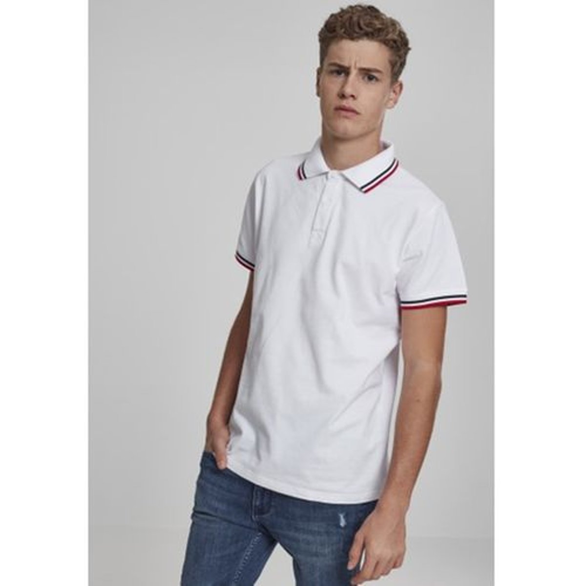 Polo rétro unicolore avec liseré tricolore