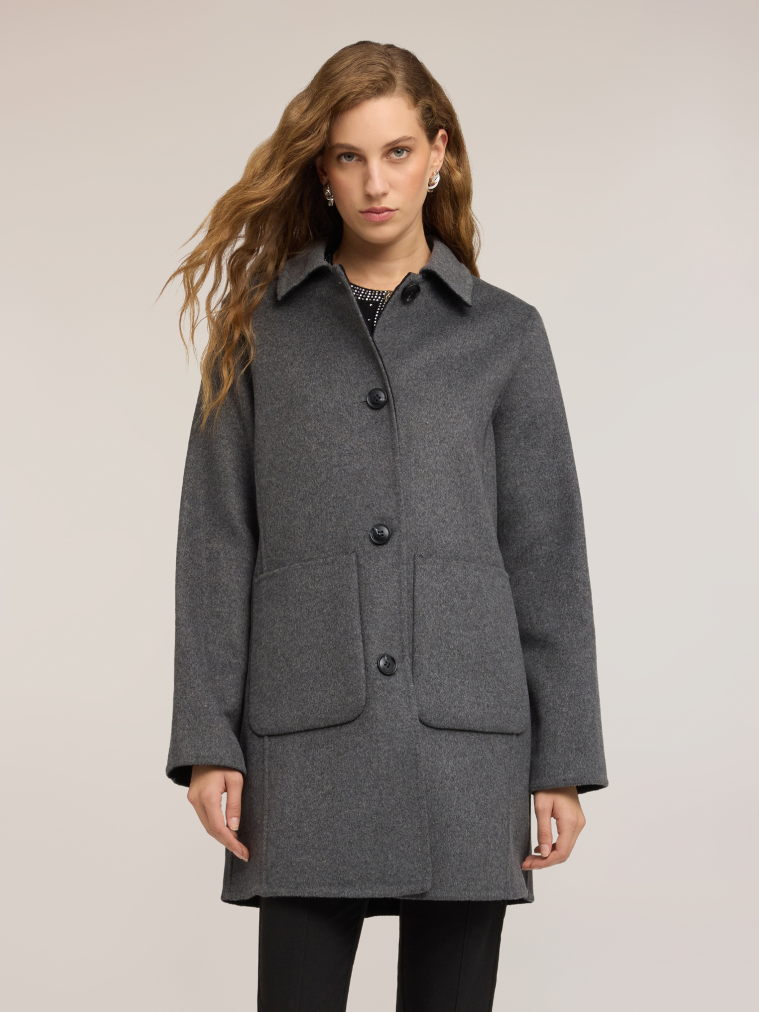 Manteau réversible, MOTIVI