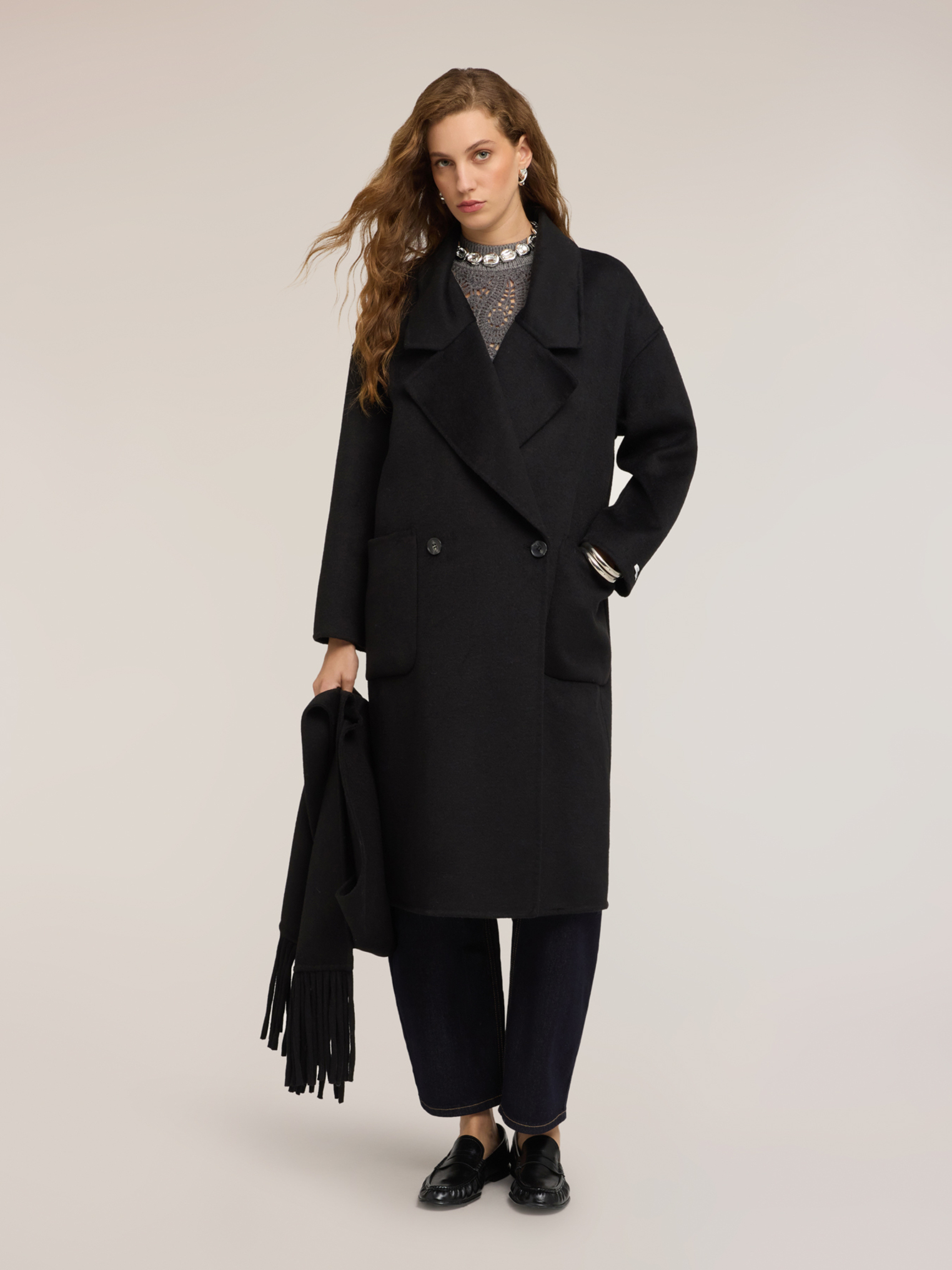 Manteau croisé, MOTIVI