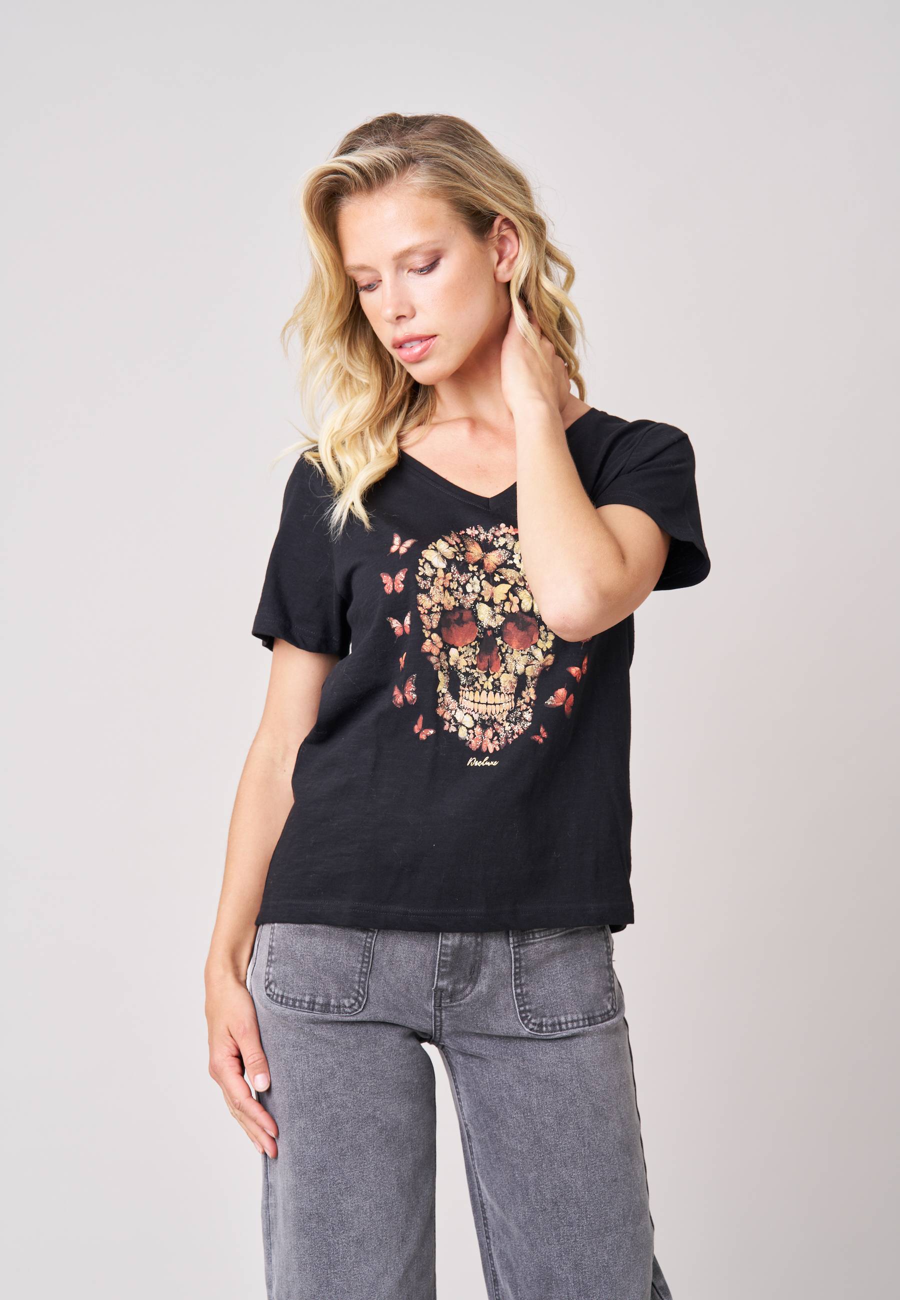 T-shirt femme en 100% coton avec imprimé tête de mort composée de papillons BESKULL, DEELUXE