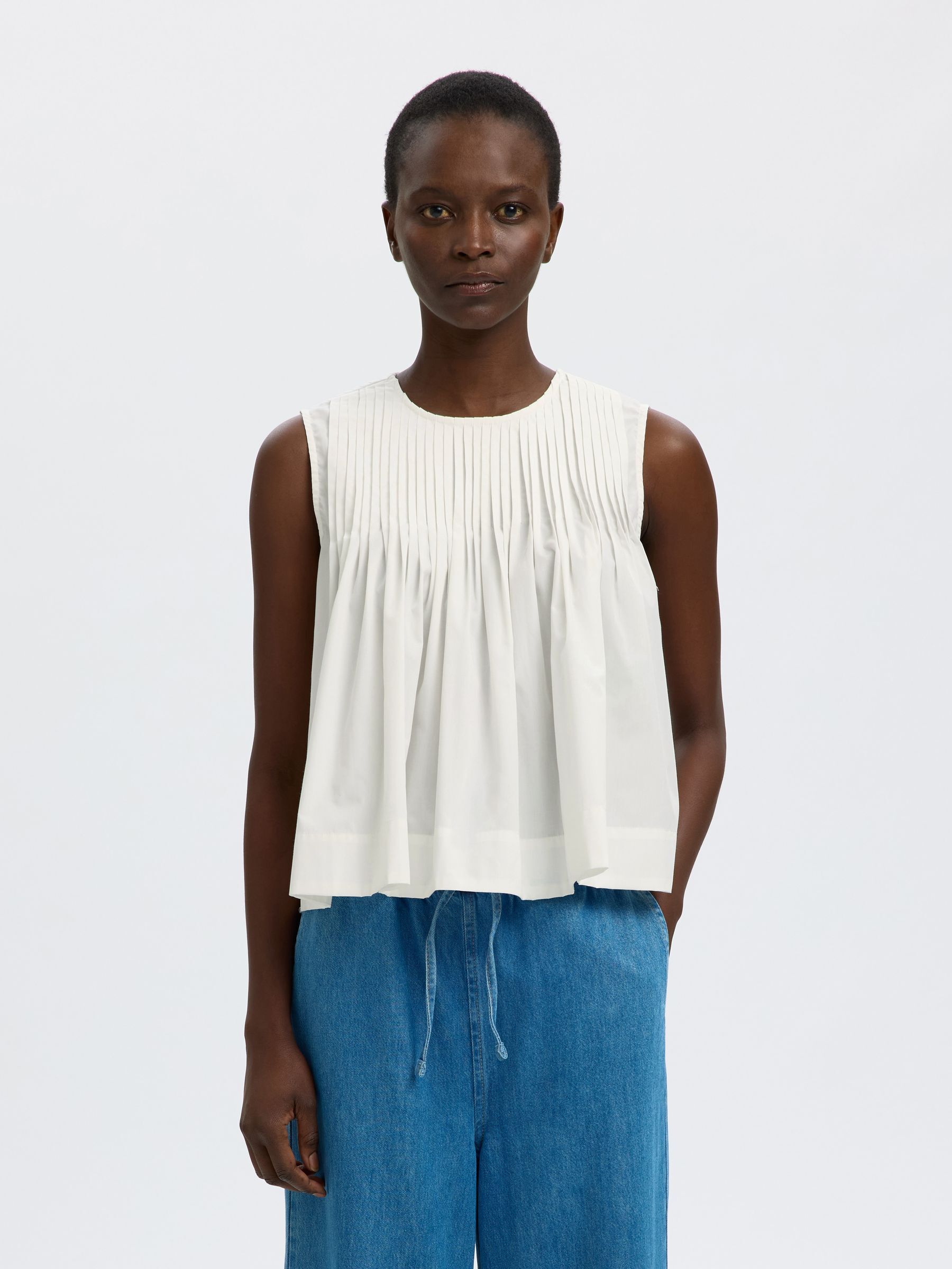 Top Sans Manches, SELECTED
