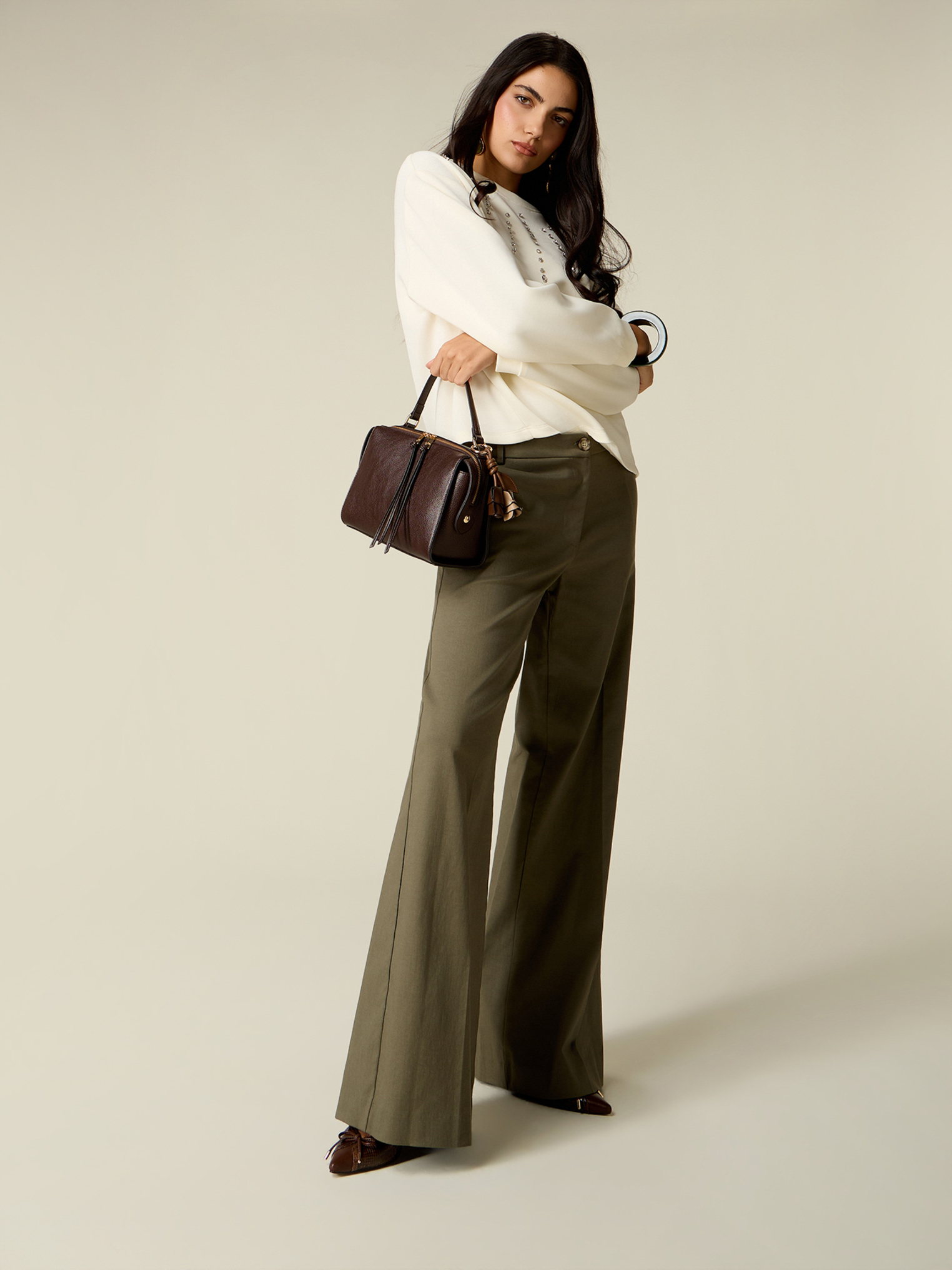 Pantalon palazzo, OLTRE