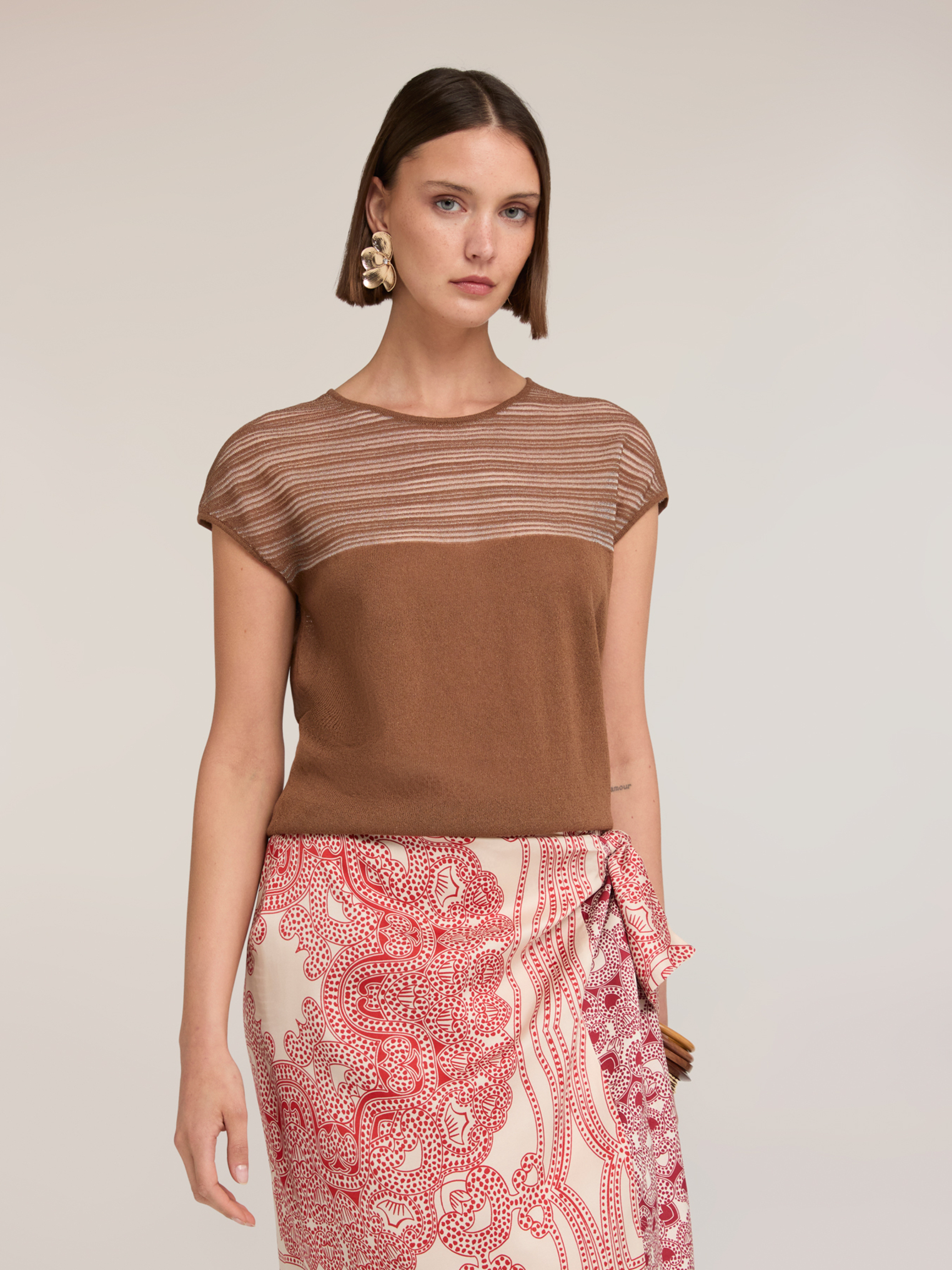 Pull à rayures, MOTIVI