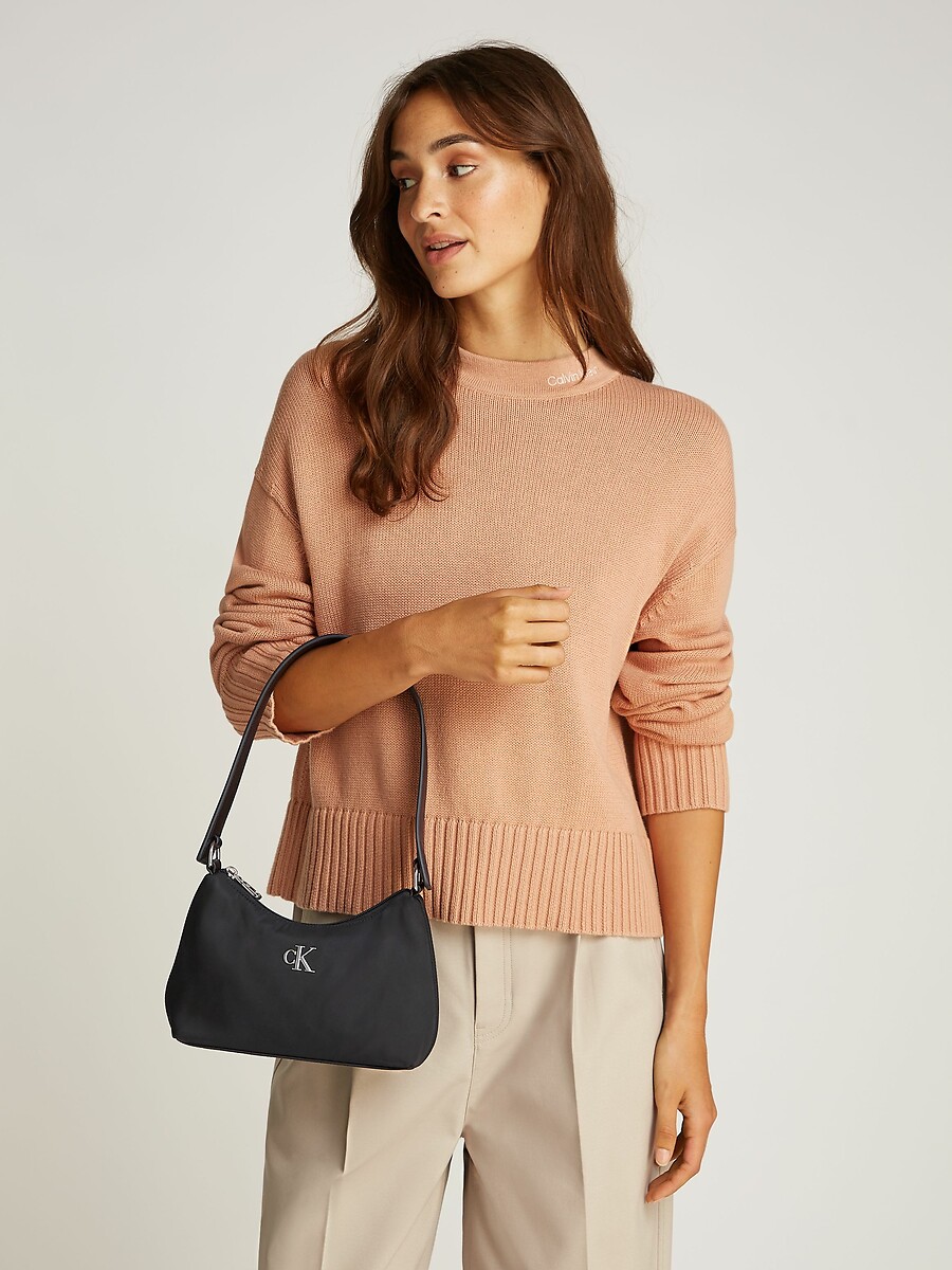 Sac zippé à bandoulière, porté épaule