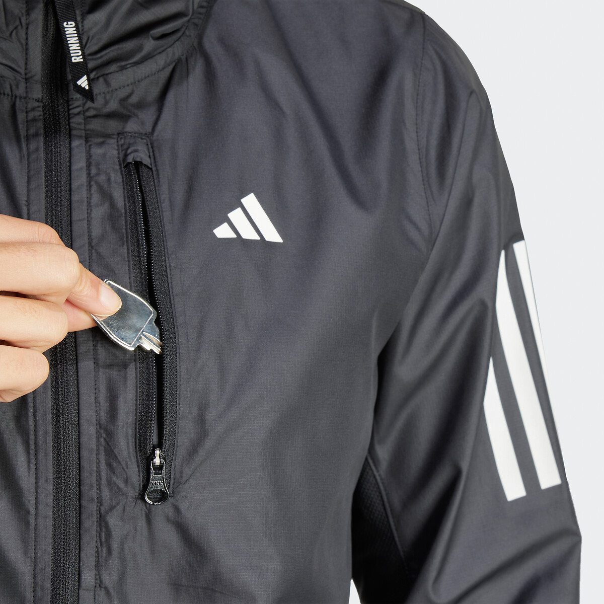 Own the run online jacket black