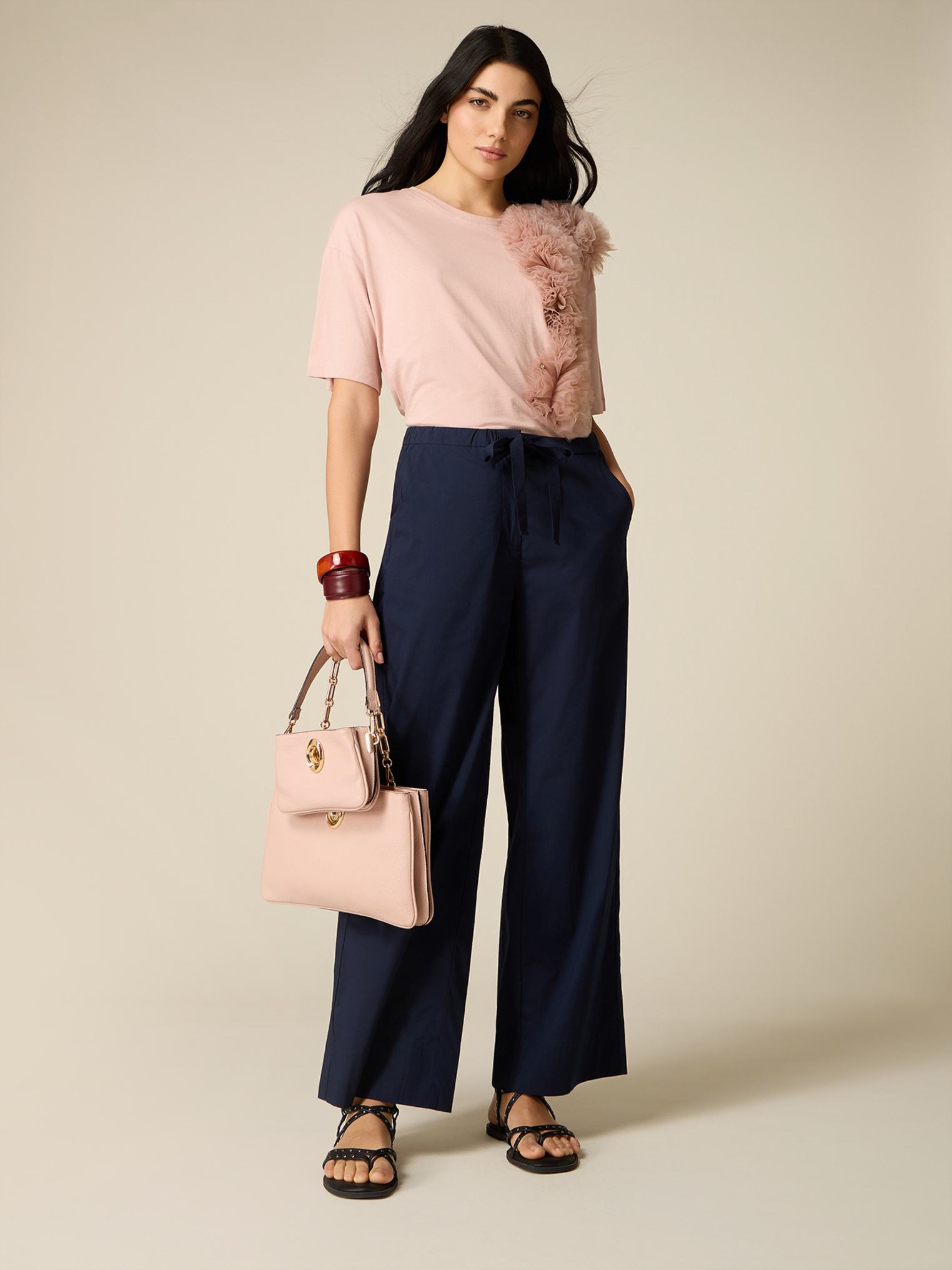 Pantalon palazzo, OLTRE