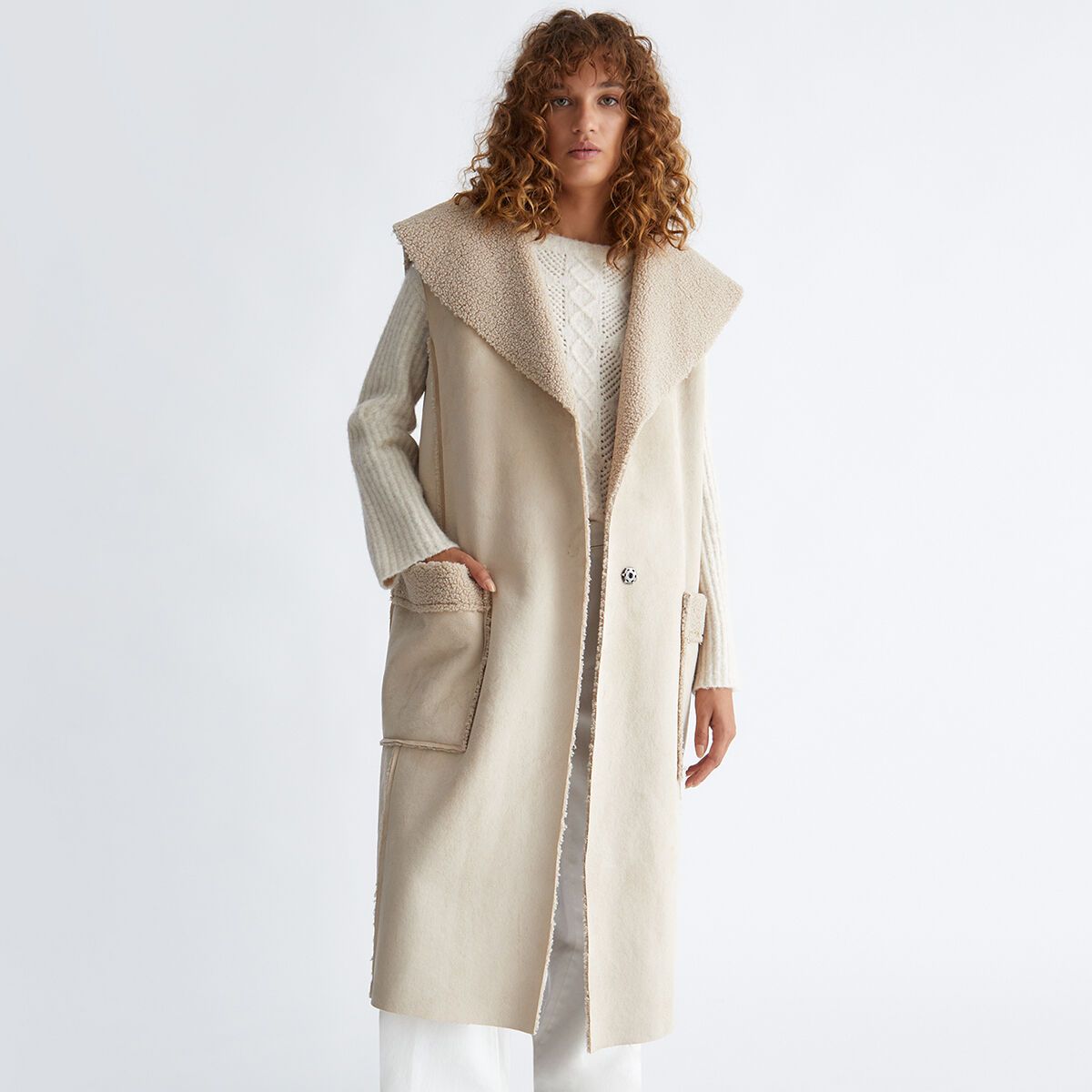 Manteau fausse peau online lainée femme