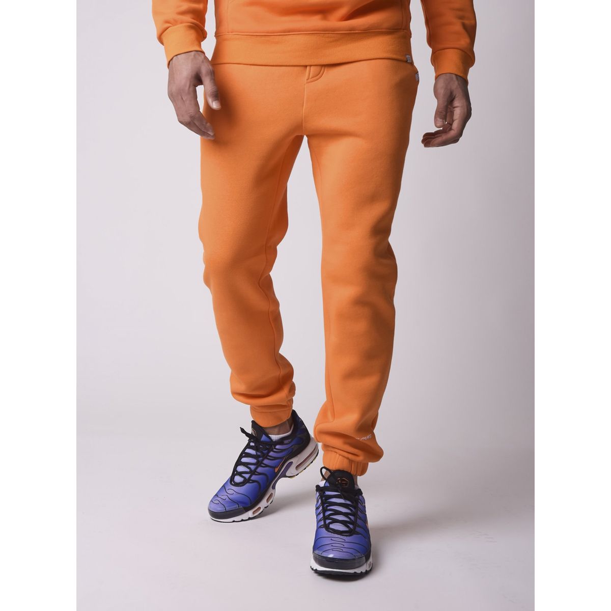 survetement nike orange homme