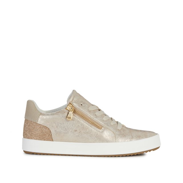 gold coloured trainers