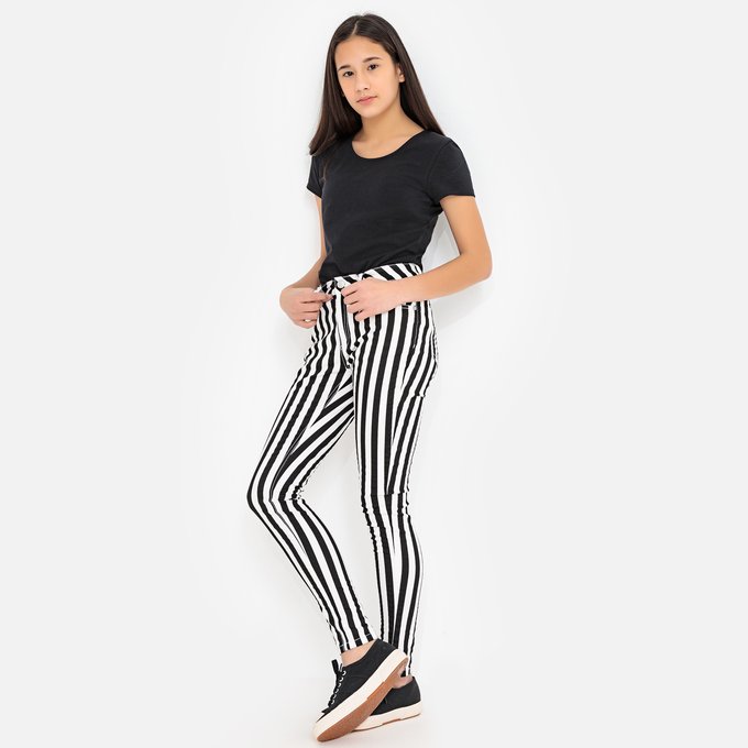 white and black striped trousers