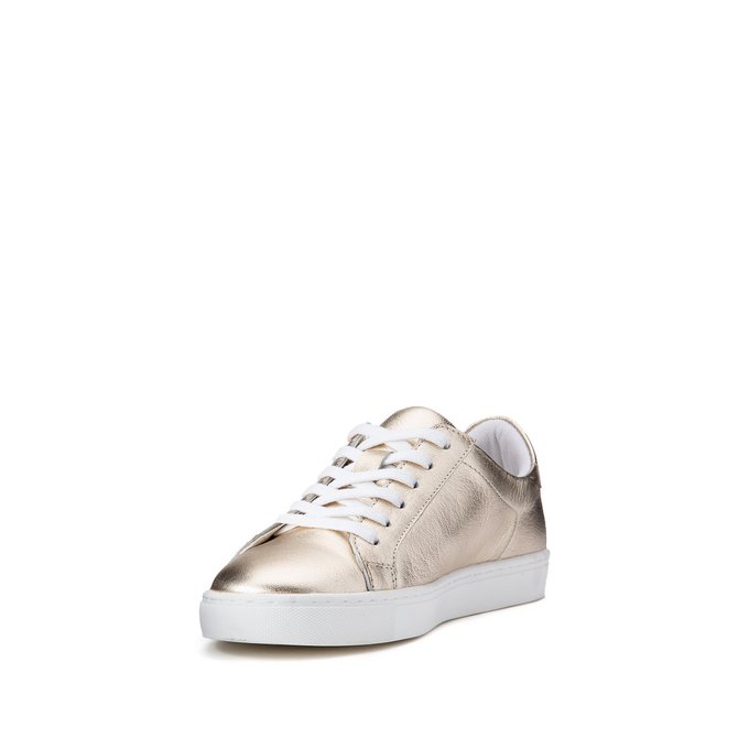 gold coloured trainers