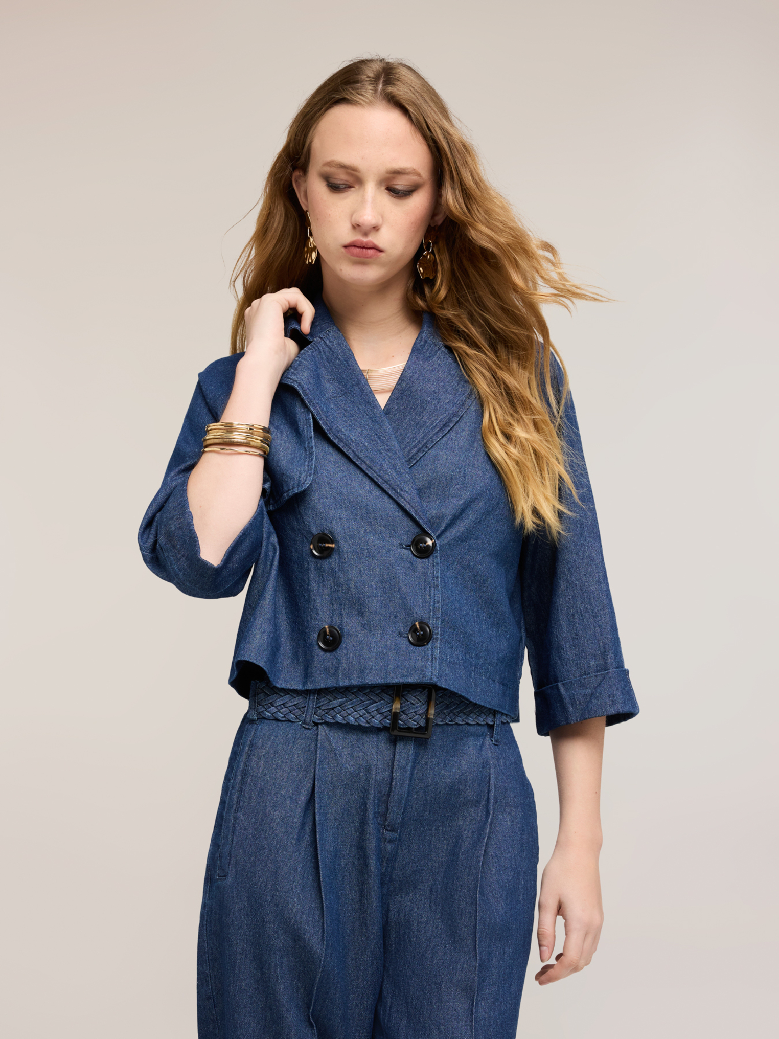 Trench court double boutonnage, MOTIVI