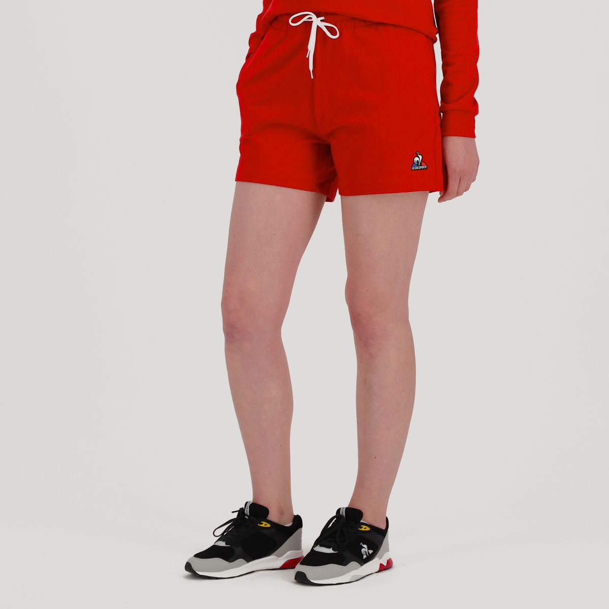 Short rouge femme discount sport