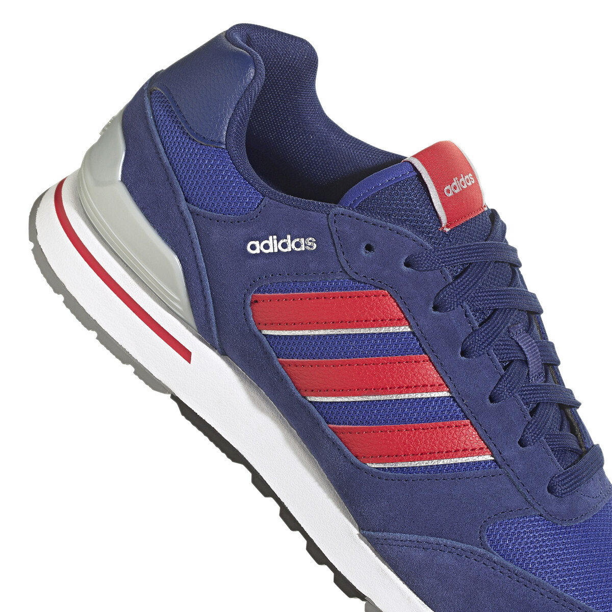 Adidas blue and top red trainers