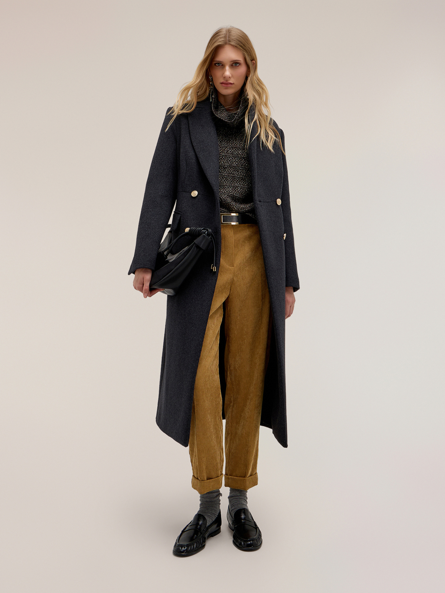 Manteau croisé, MOTIVI
