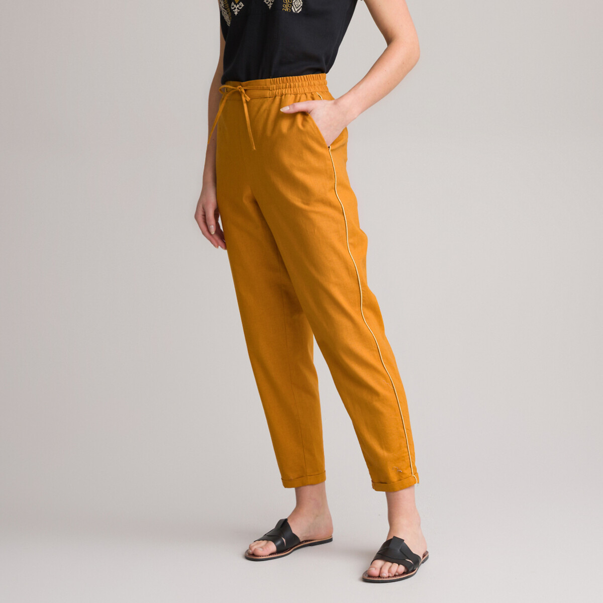 Buy Aayna Women Beige Regular Fit Self Design Peg Trousers at Amazonin