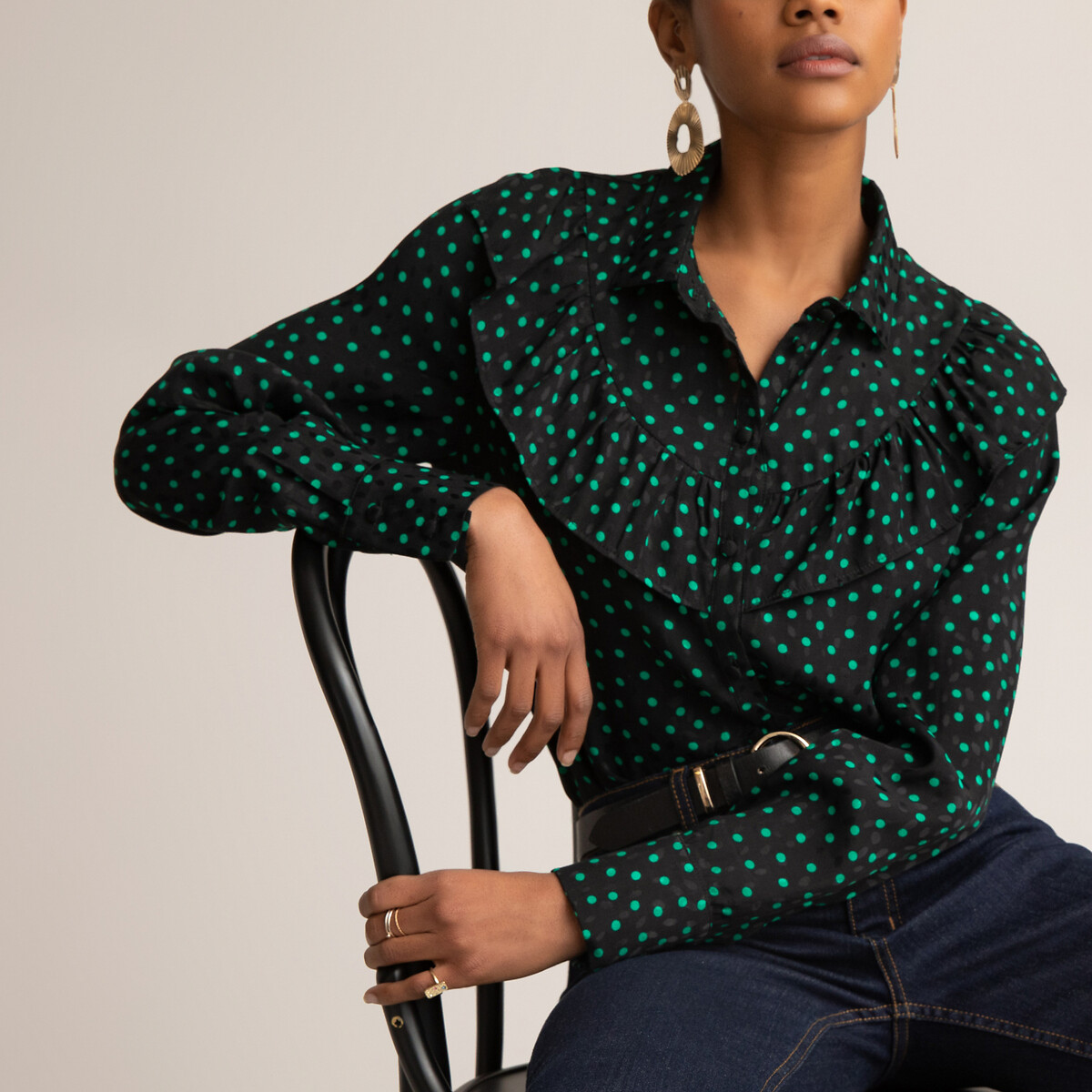 green and black polka dot blouse