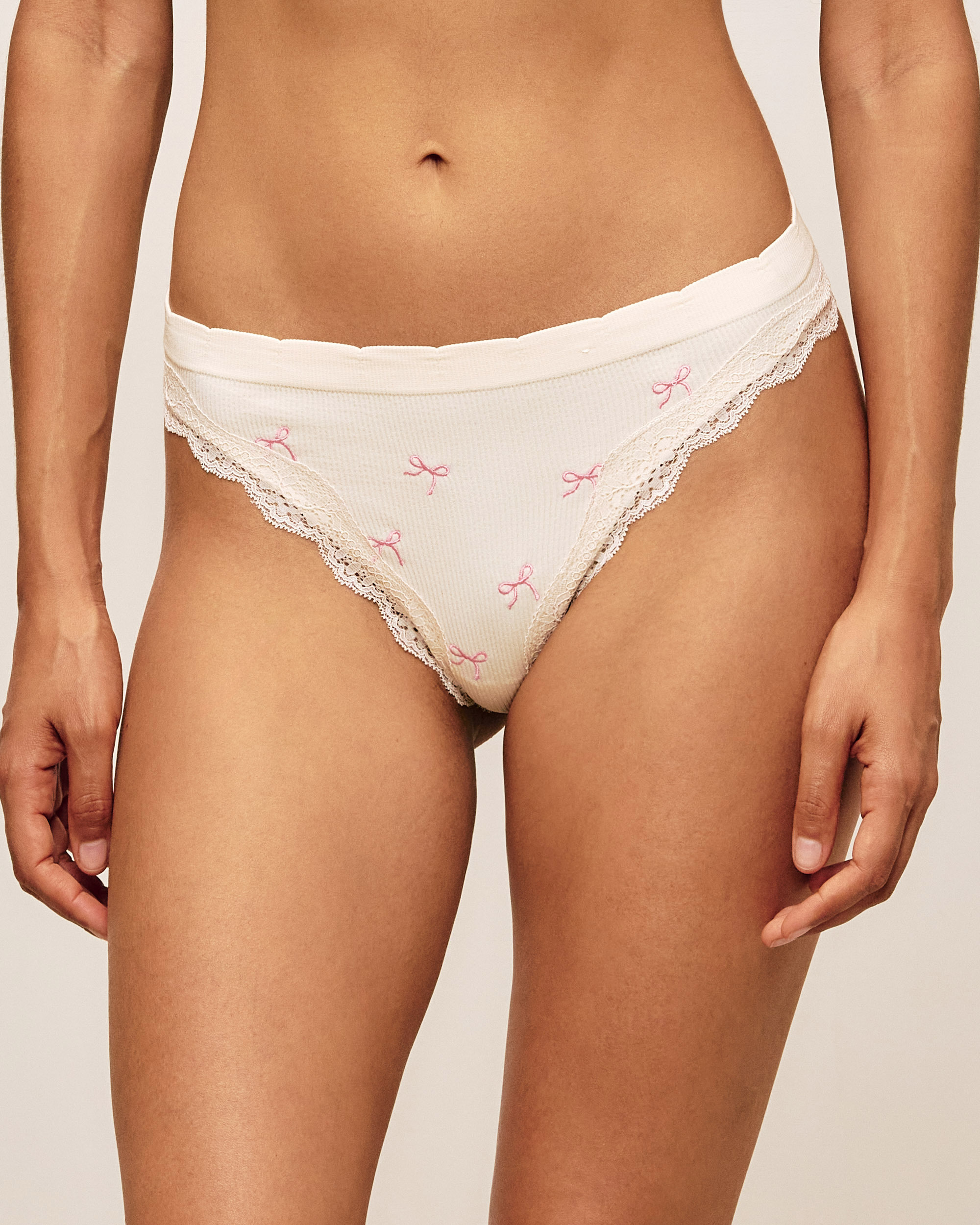 Tanga en seamless et dentelle brodée de nœuds BOWCUPIDOIZ, UNDIZ