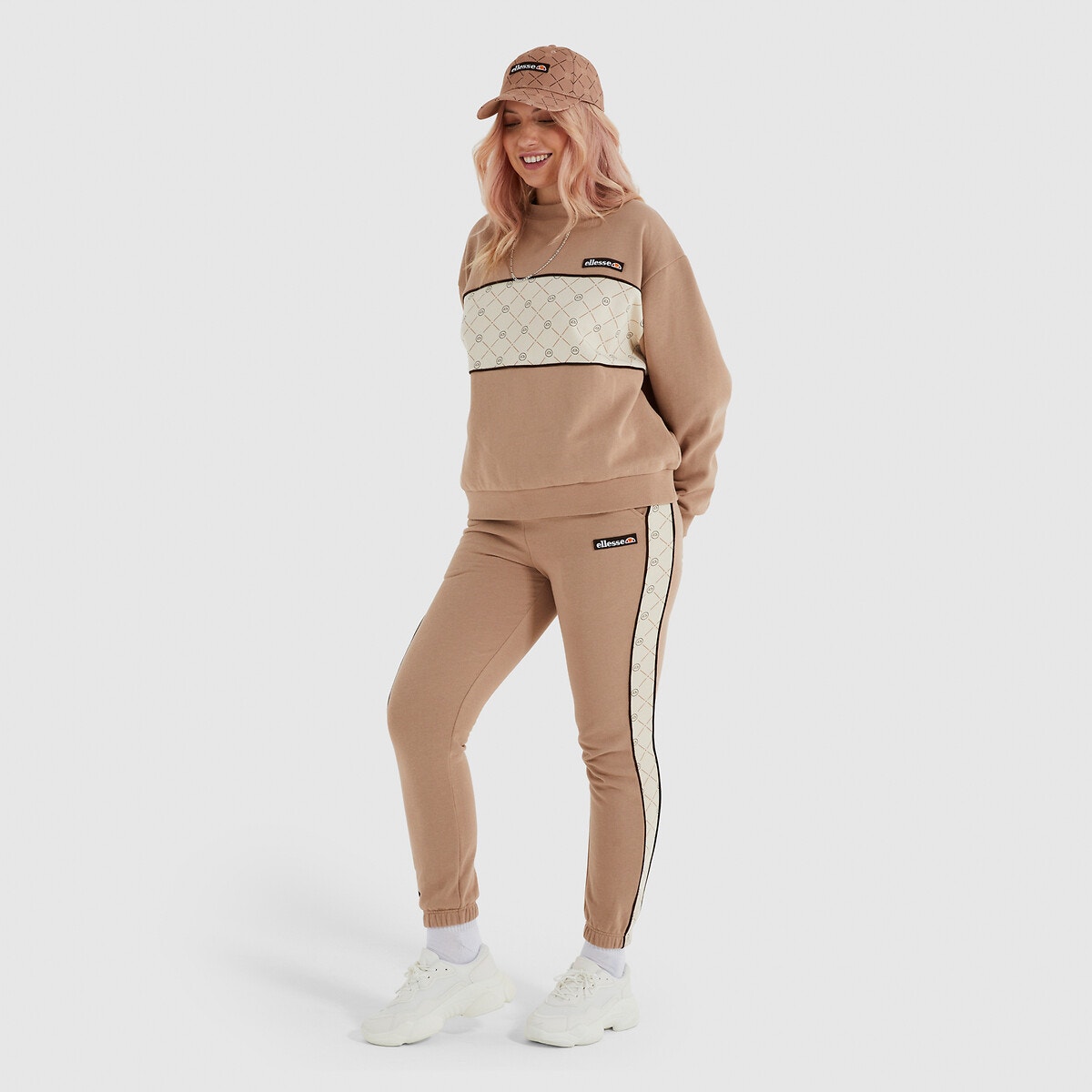 Ensemble jogging femme ellesse sale