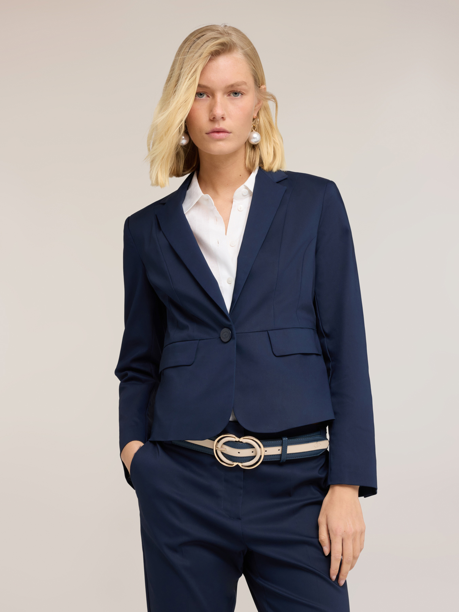 Blazer sur mesure, MOTIVI
