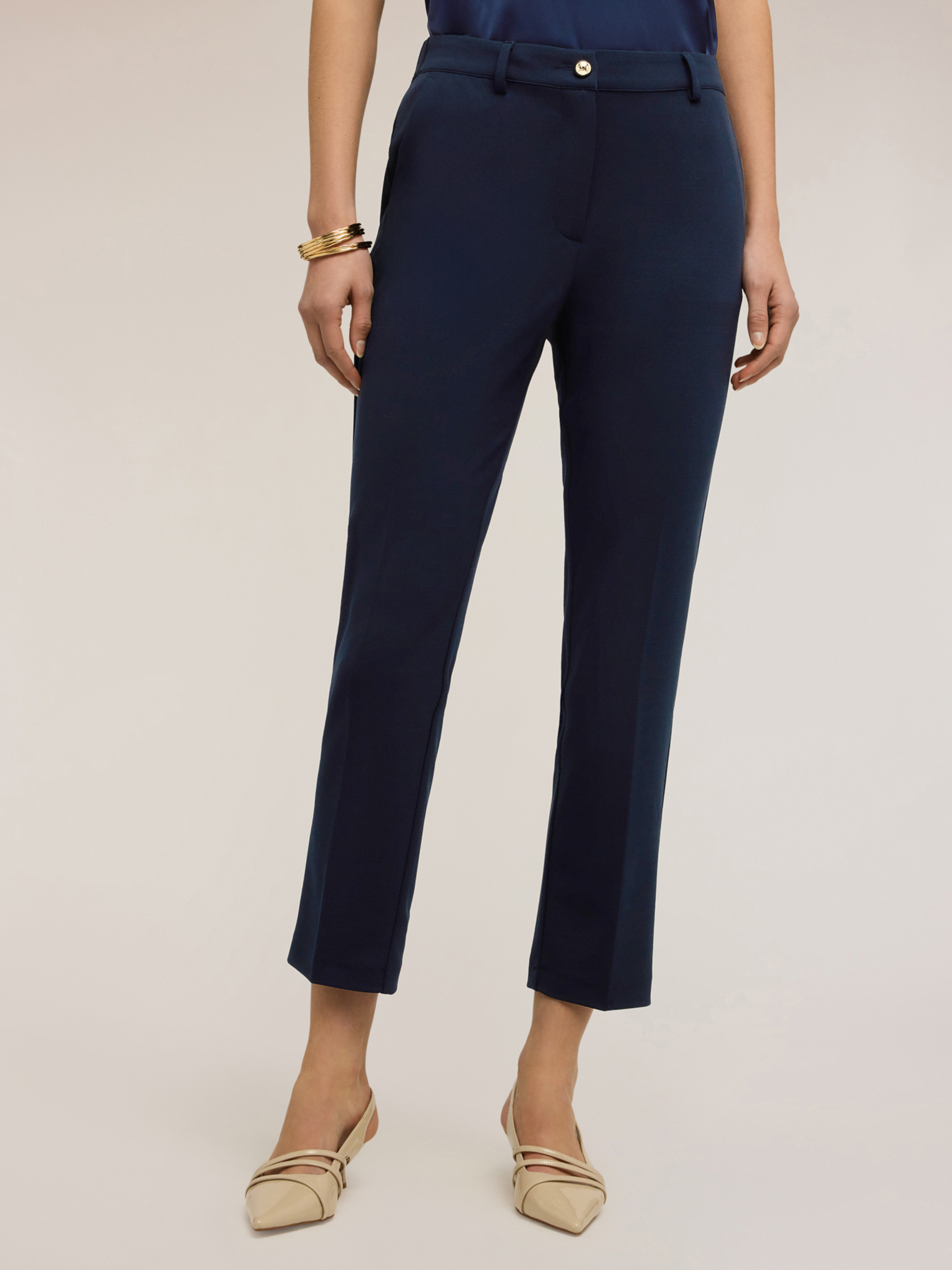 Pantalon chino, MOTIVI