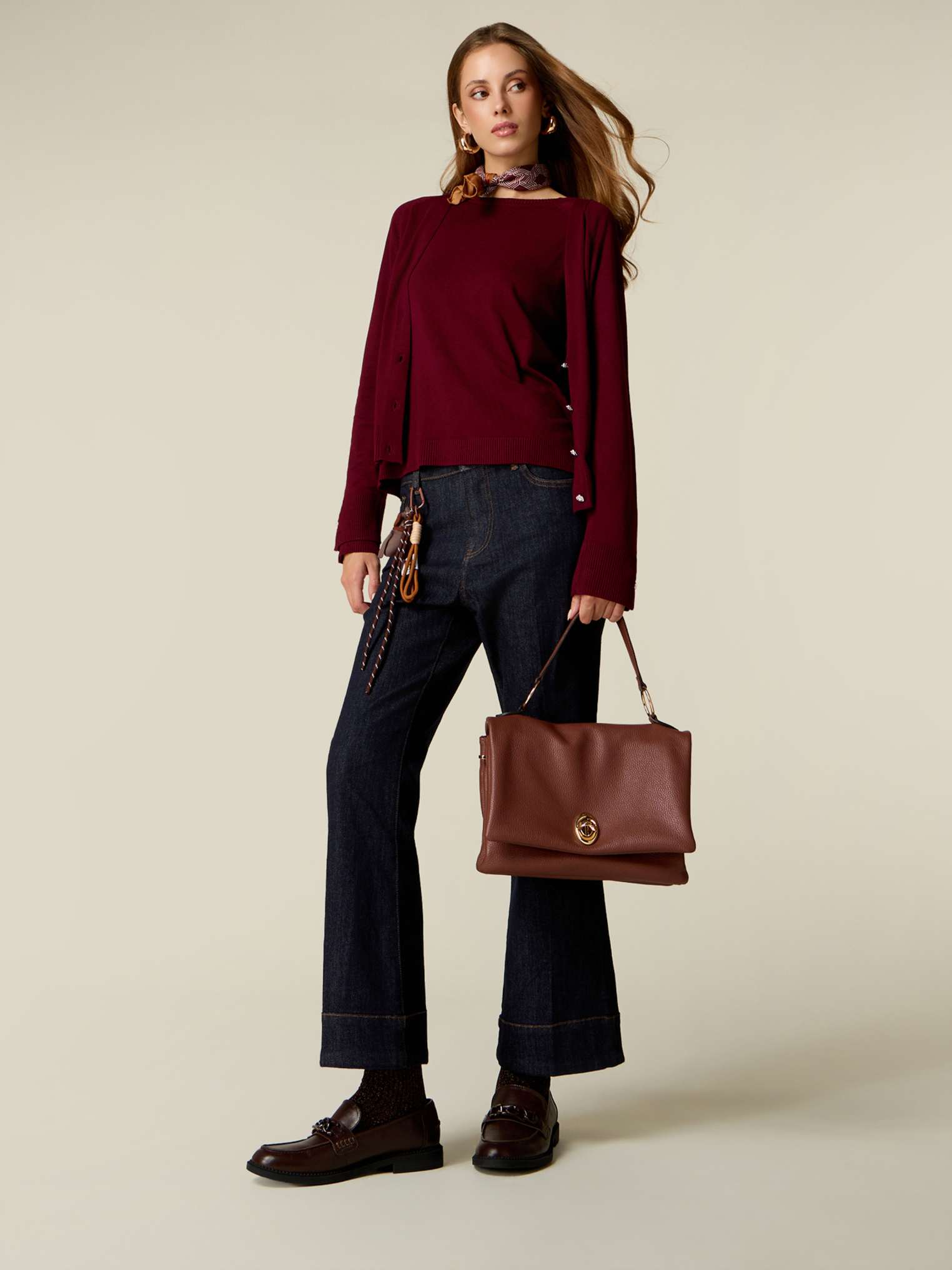 Jean flare taille haute avec charm, OLTRE